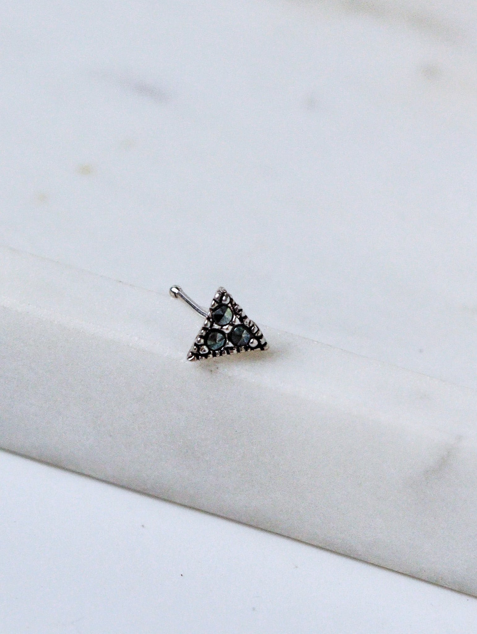 Trikona Charm Oxidized Nose Pin