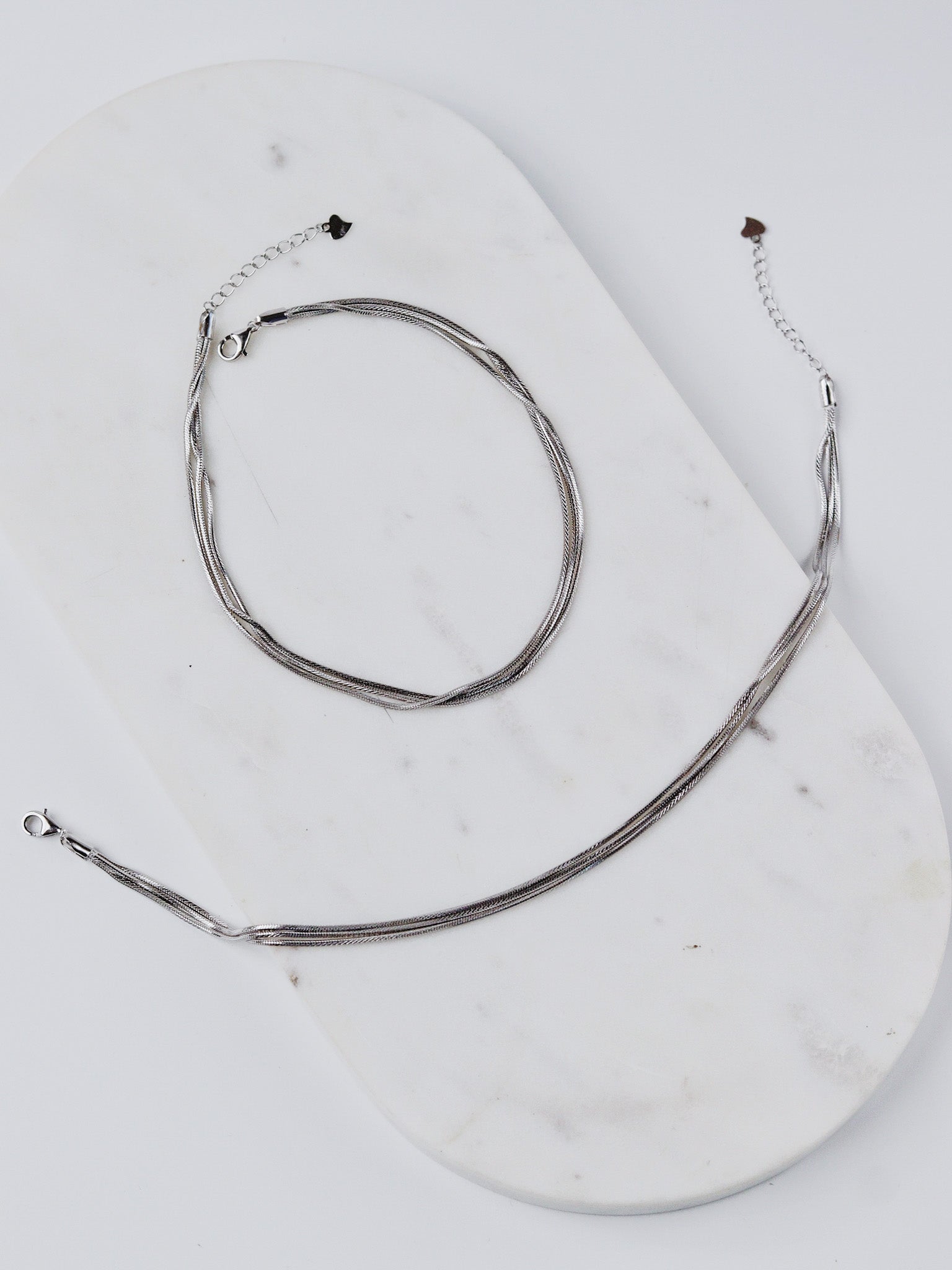 Twisted Gleam Silver Anklet Set