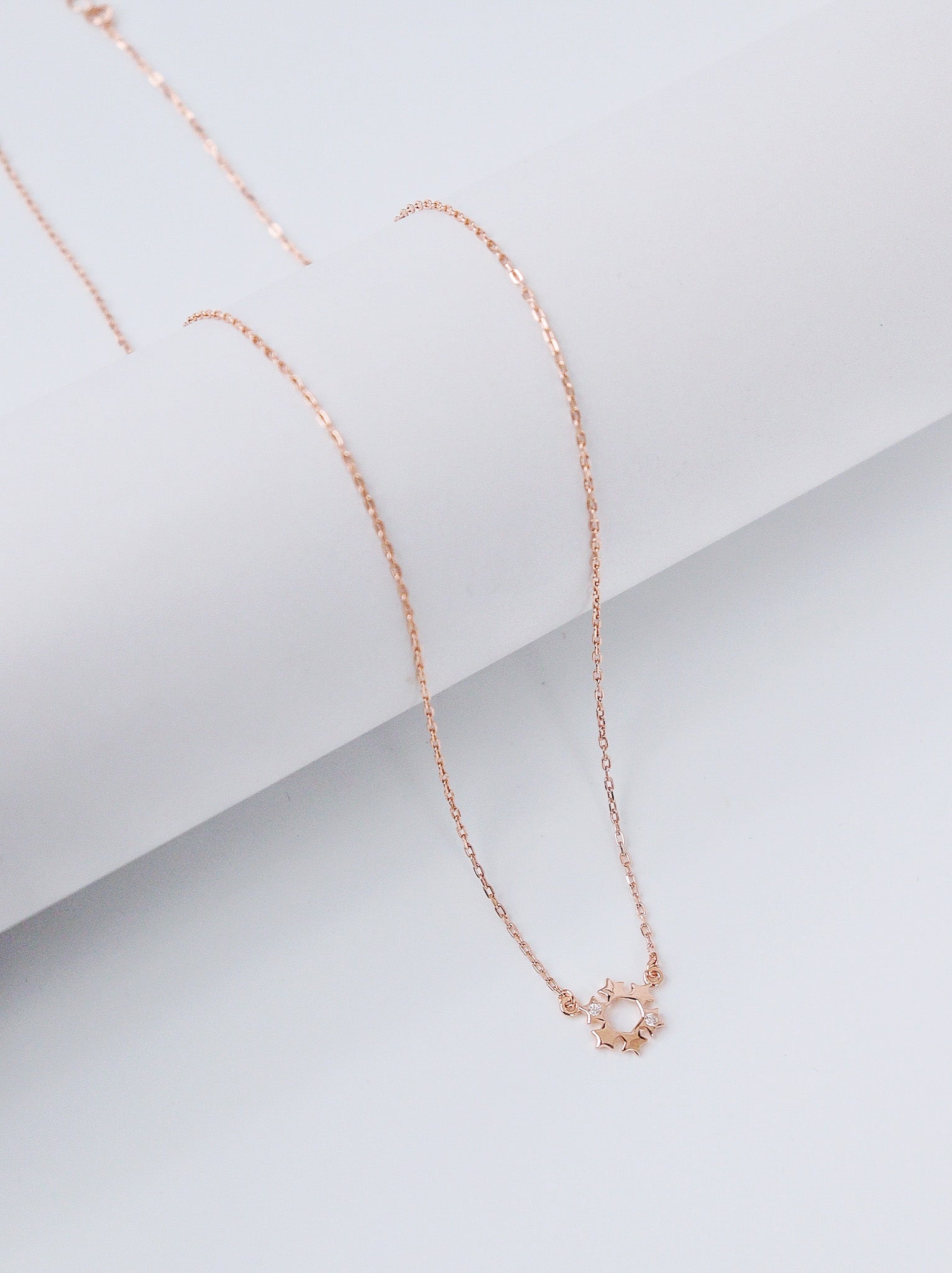Rose Gold Sunburst Charm Necklace